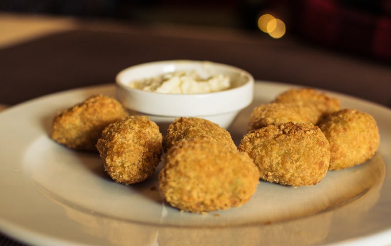 Vibrant bar area with drinks on display