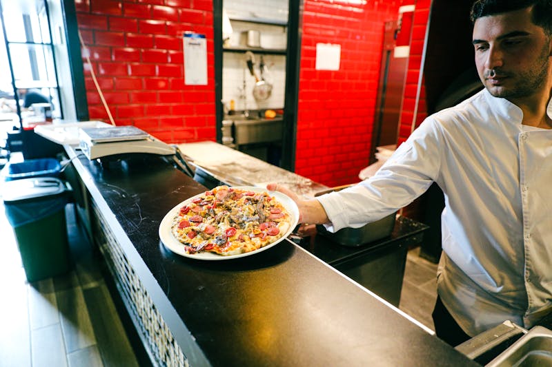 Open kitchen view showing chefs at work
